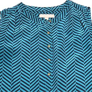 Banana Republic silk sleeveless blouse with metal buttons.